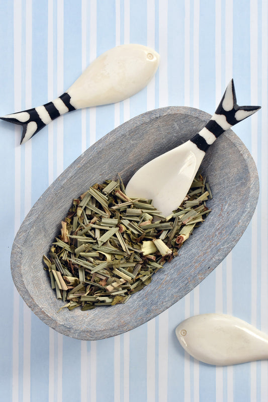 Set of Four Hand Carved Bone Fish Spoons