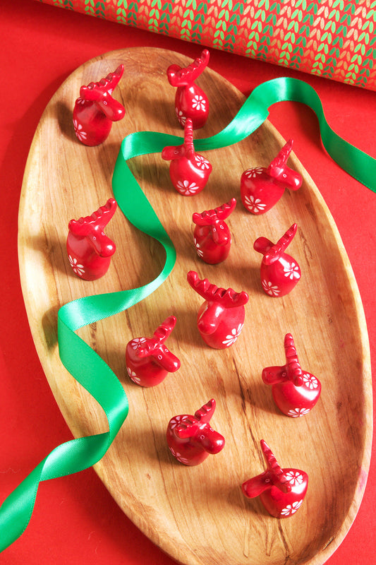 One Dozen Miniature Red Soapstone Reindeer